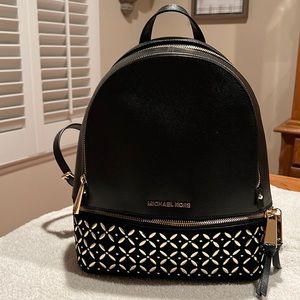 Michael Kors backpack with gold hardware